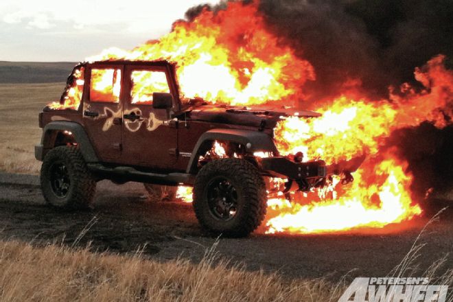 131_1304_01+best_of_whoops_off_road_mishaps+jeep_on_fire.jpg