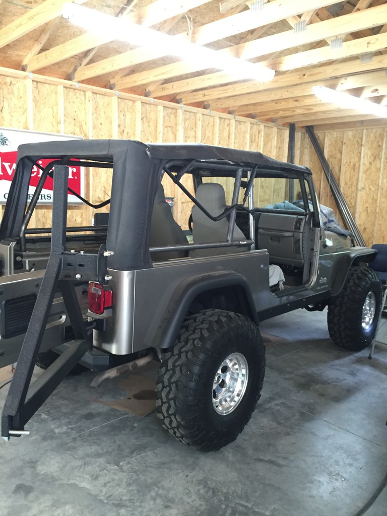 ai1024.photobucket.com_albums_y309_95builtjeep_Fab_20Work_38BA40f9ebe9e6f621312481451bf36ffa9b.jpg