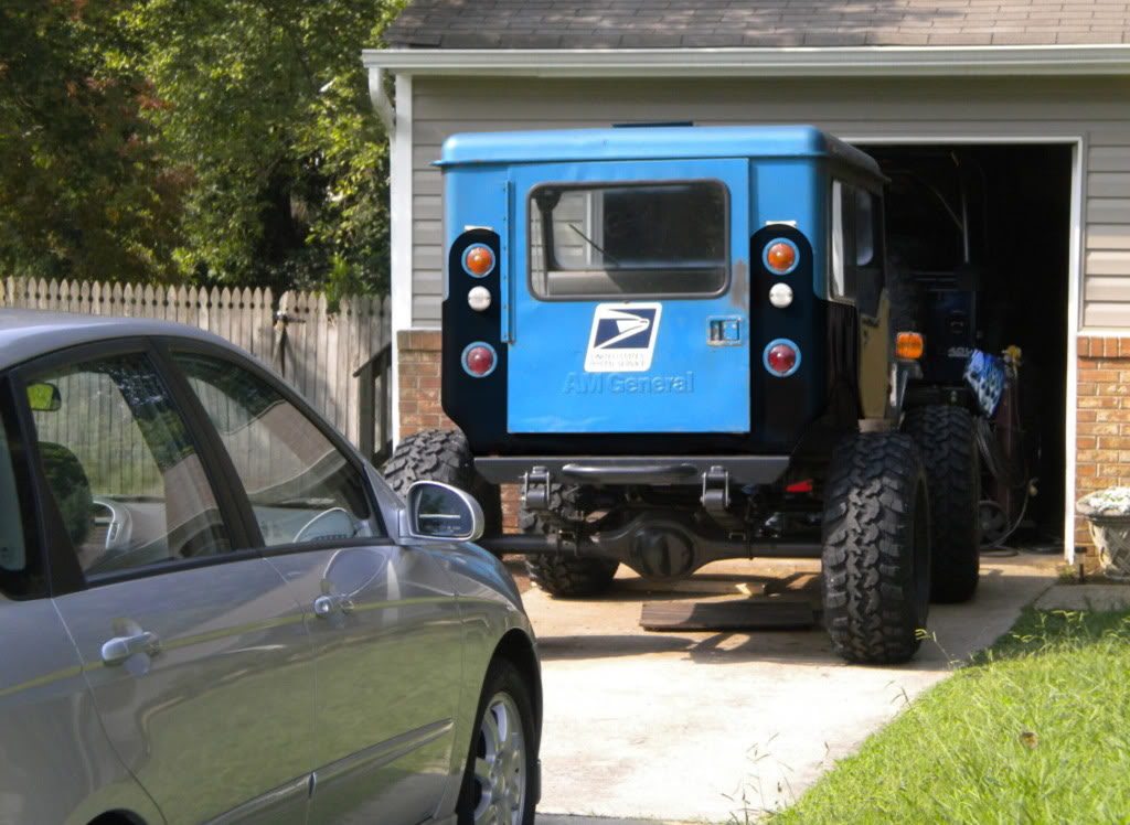 ai1024.photobucket.com_albums_y309_95builtjeep_gone_20postal_chad_jeep_8_10_back.jpg