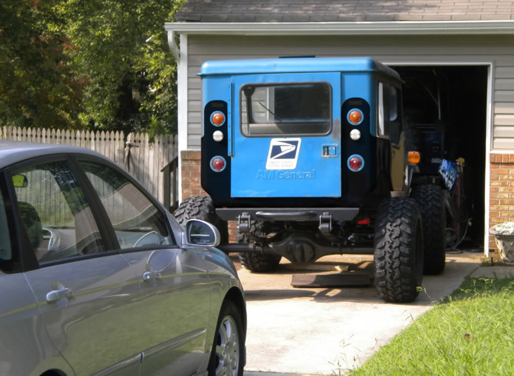 ai1024.photobucket.com_albums_y309_95builtjeep_gone_20postal_chad_jeep_8_10_back_1.jpg