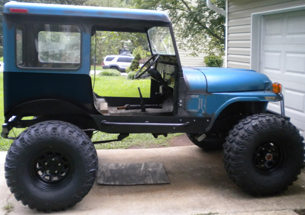 ai1024.photobucket.com_albums_y309_95builtjeep_gone_20postal_chad_jeep_8_10_side.jpg