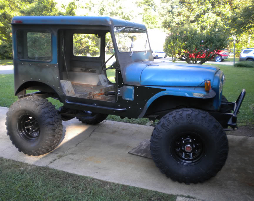 ai1024.photobucket.com_albums_y309_95builtjeep_gone_20postal_jeep_side_armor2.jpg