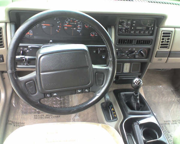 ai115.photobucket.com_albums_n288_96jeepzj_1994JeepGrandCherokeeLaredo4X45s_1.jpg