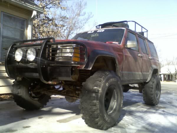 ai1176.photobucket.com_albums_x321_old_red01_jeepsnow.jpg