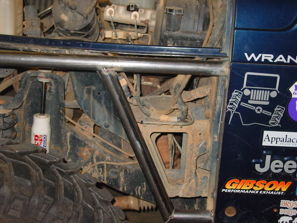 ai298.photobucket.com_albums_mm279_burrellsjeep_Linked_SideTube.jpg