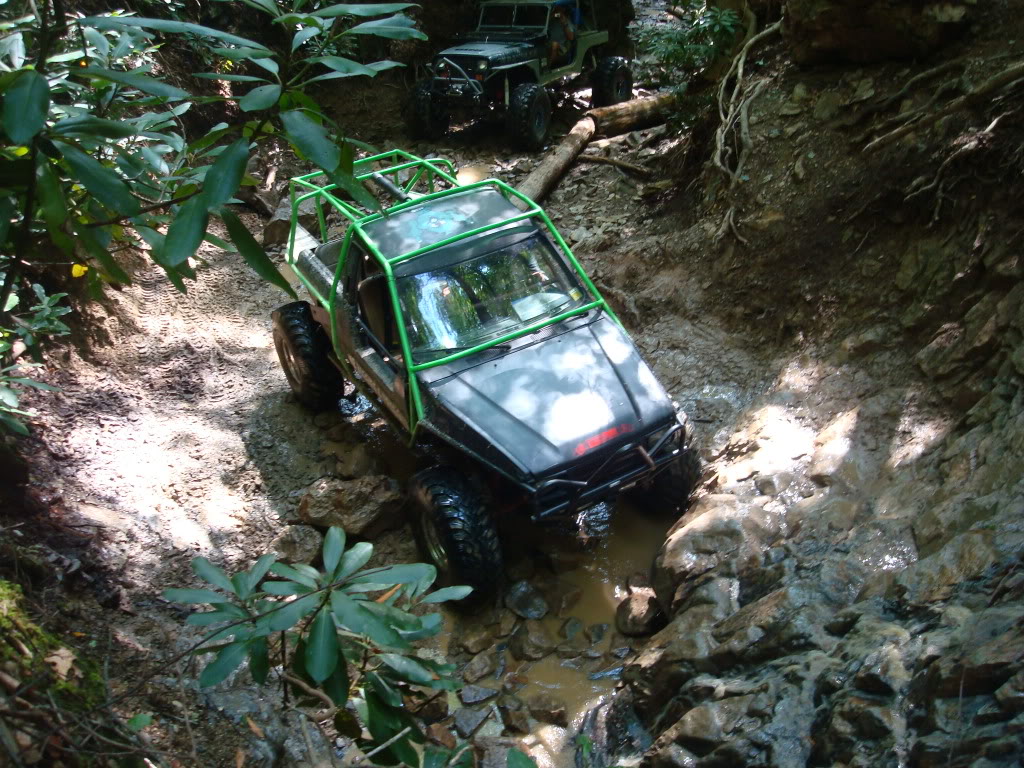 ai298.photobucket.com_albums_mm279_burrellsjeep_TJC_toy_20run_20August_202010_ShaneonWaterFall.jpg