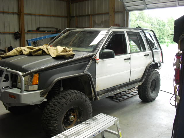 ai358.photobucket.com_albums_oo27_CW_2009_Jeepexo1.jpg