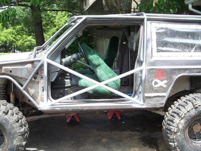 ai85.photobucket.com_albums_k51_hadfield4wd_My_20Jeep_doorbars007.jpg