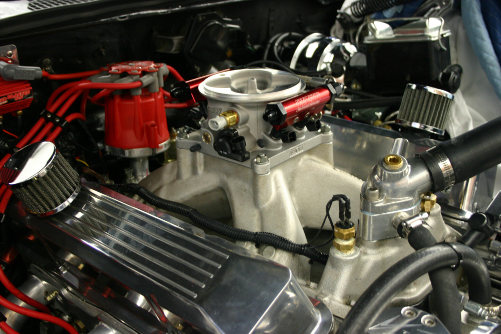 ajerryforthofer.files.wordpress.com_2010_12_11_30_10_ez_efi_throttle_body_sm.jpg