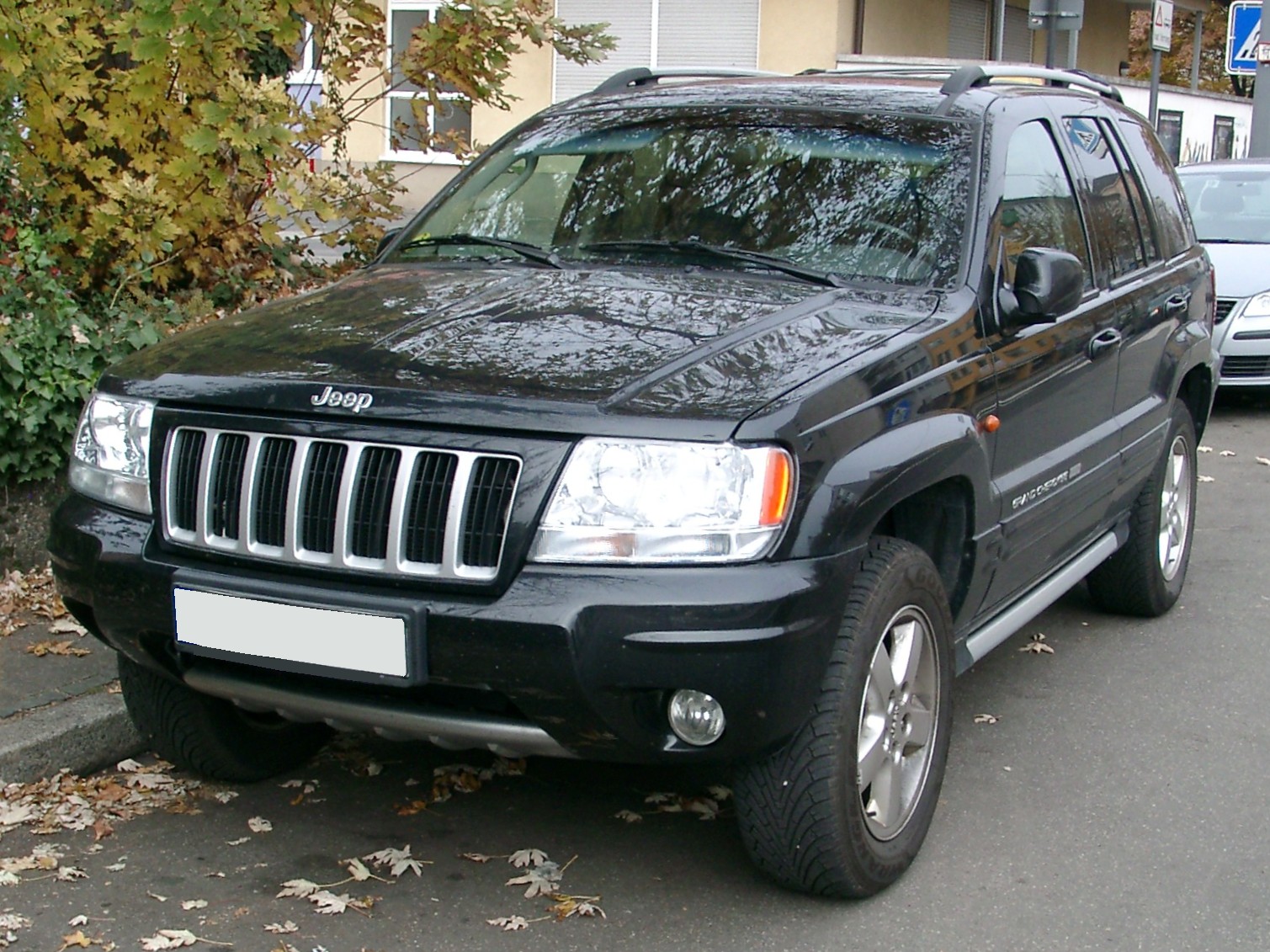 aupload.wikimedia.org_wikipedia_commons_2_20_Jeep_Grand_Cherokee_WJ_front_20071102.jpg