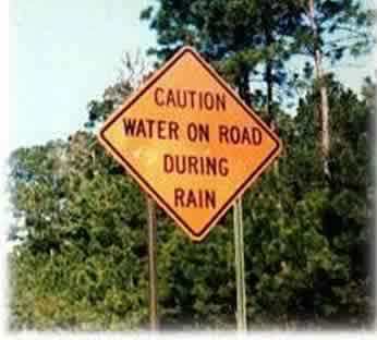 caution-water-on-road-during-rain-serious-yet-funny.jpeg