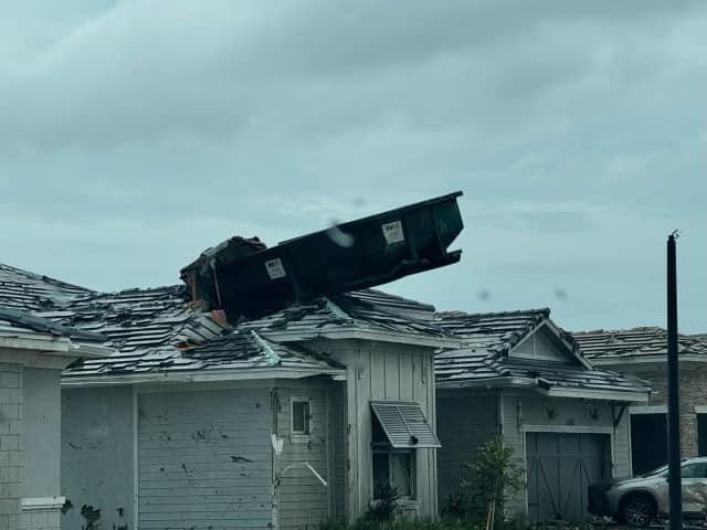 dumpster on roof.jpg