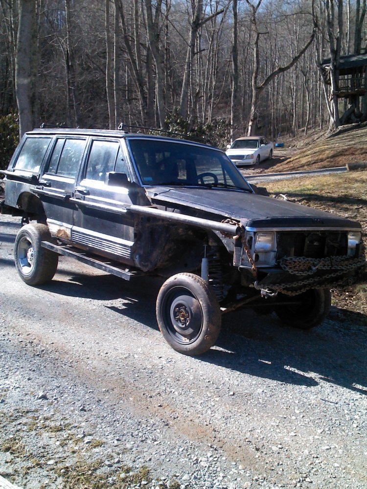 my jeep on wagon wheels.jpg