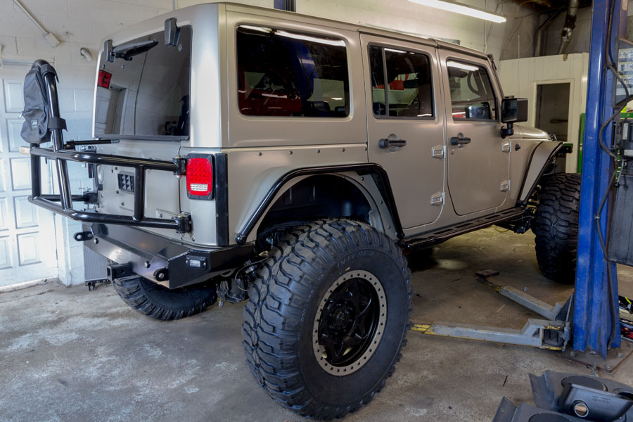 project-vandal-jeep-jk-rubicon-unlimited-darren-build-top-doors-on-rear-tire-carrier.jpg