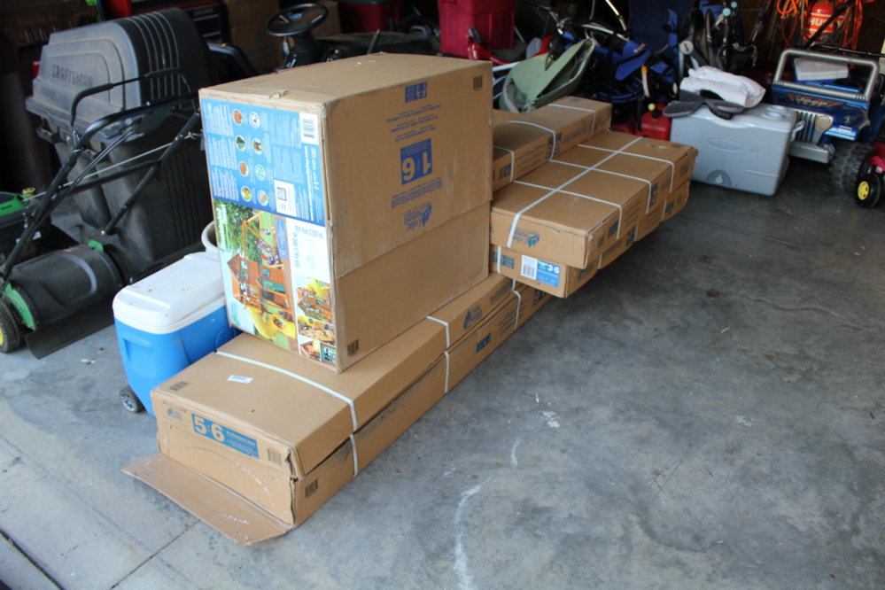 Swing set in boxes.JPG